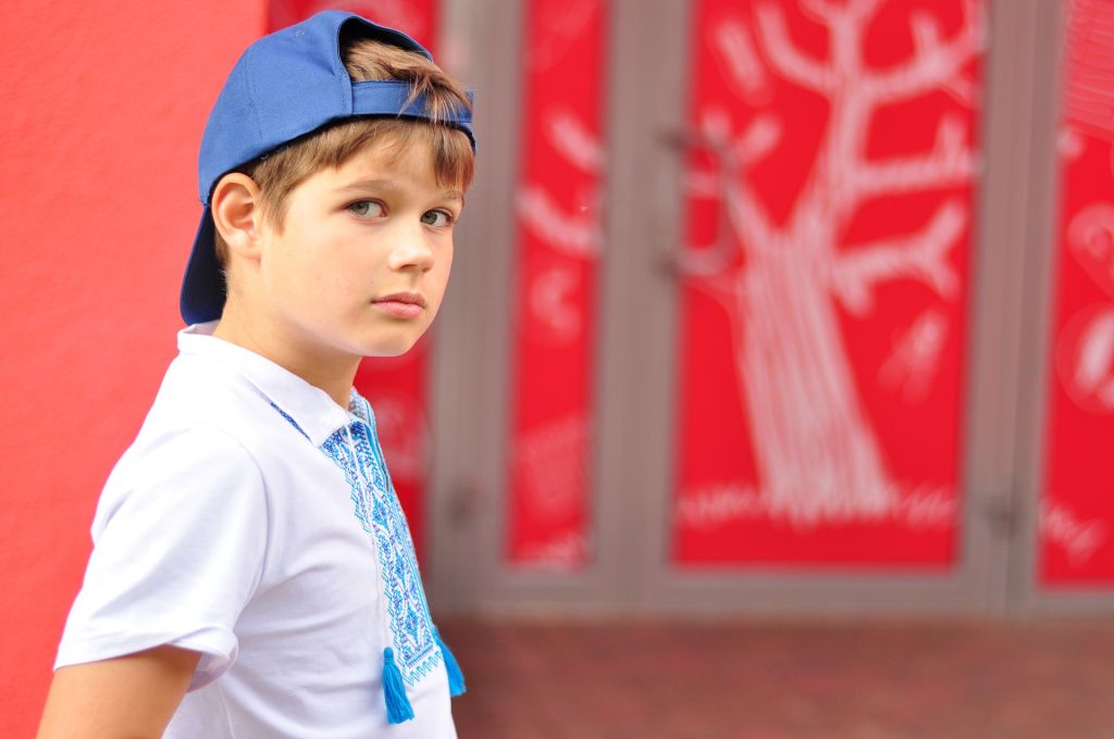 Schüler mit blauer Mütze. Pisastudie